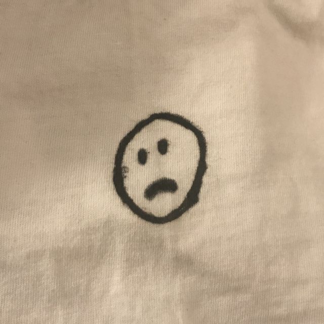 Zeichnung von einem traurigen Smiley